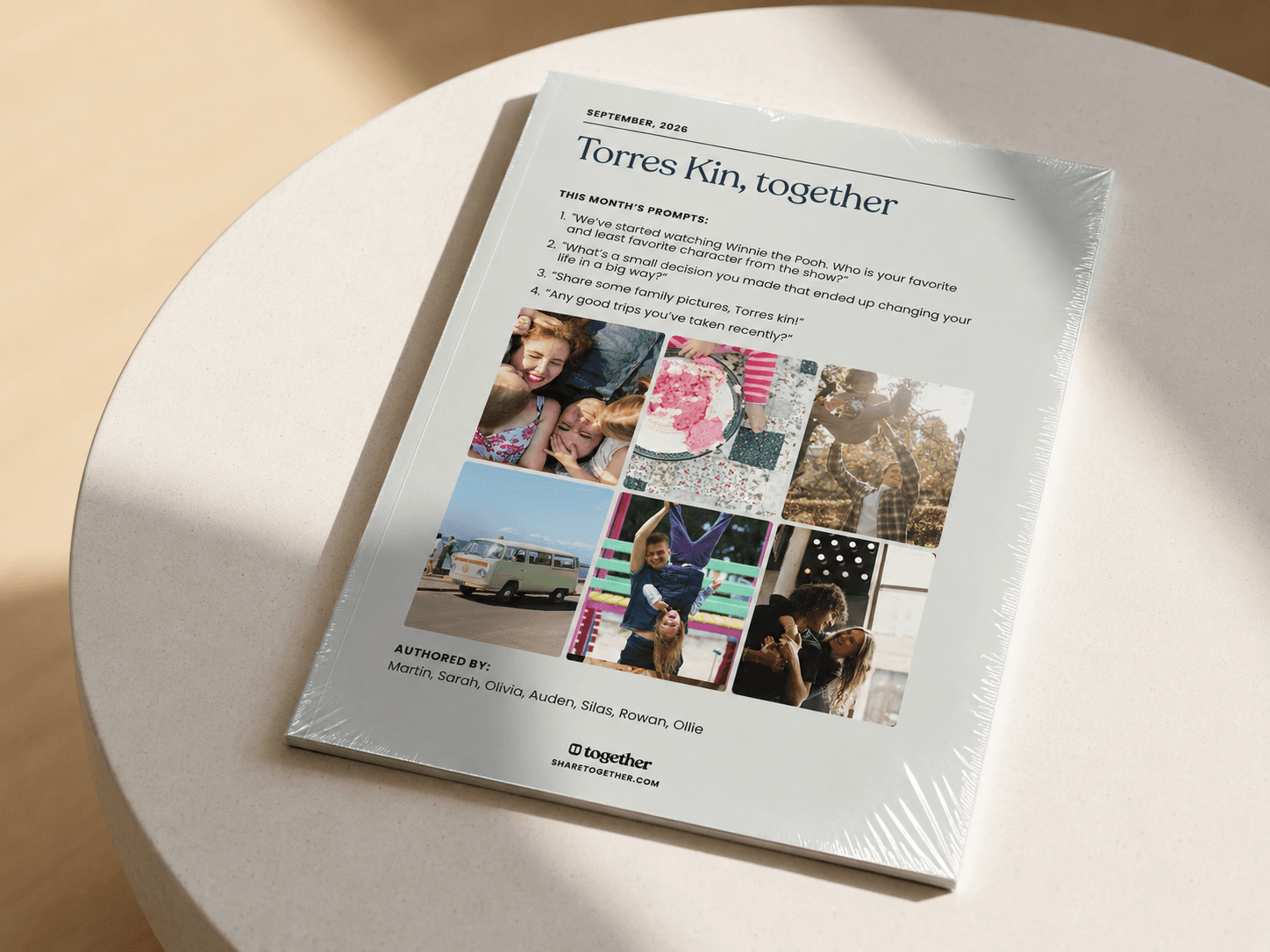 A wrapped Together print journal for the Torres family, with monthly prompts and a collage of family photos on its cover.